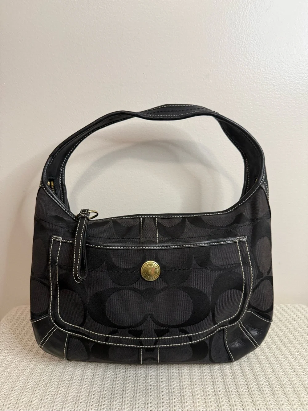 Coach Ergo Signature Jacquard Hobo bag featuring a black-on-black